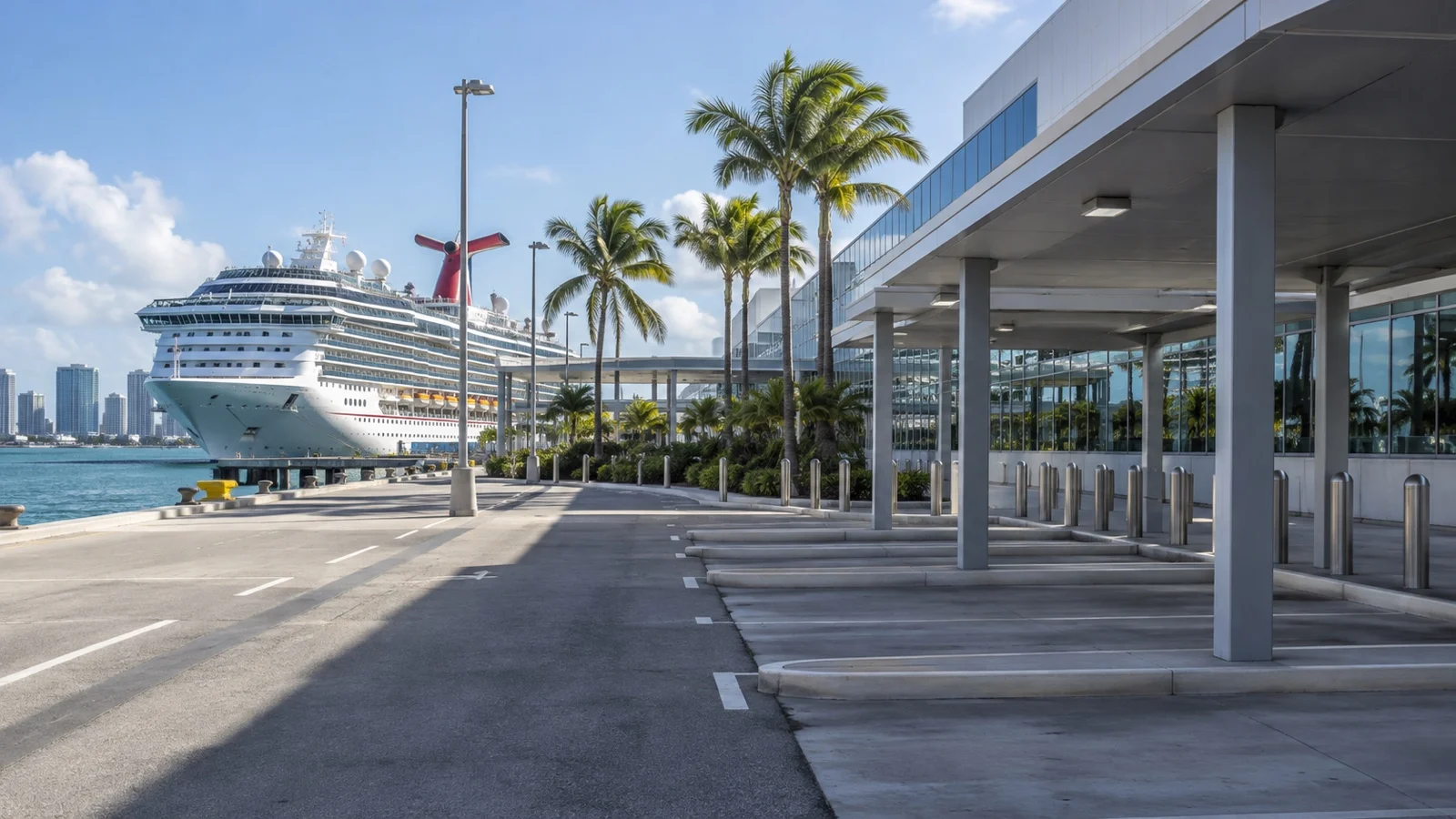 Empty covered vehicle return lane beside a cruise port terminal with ship beyond