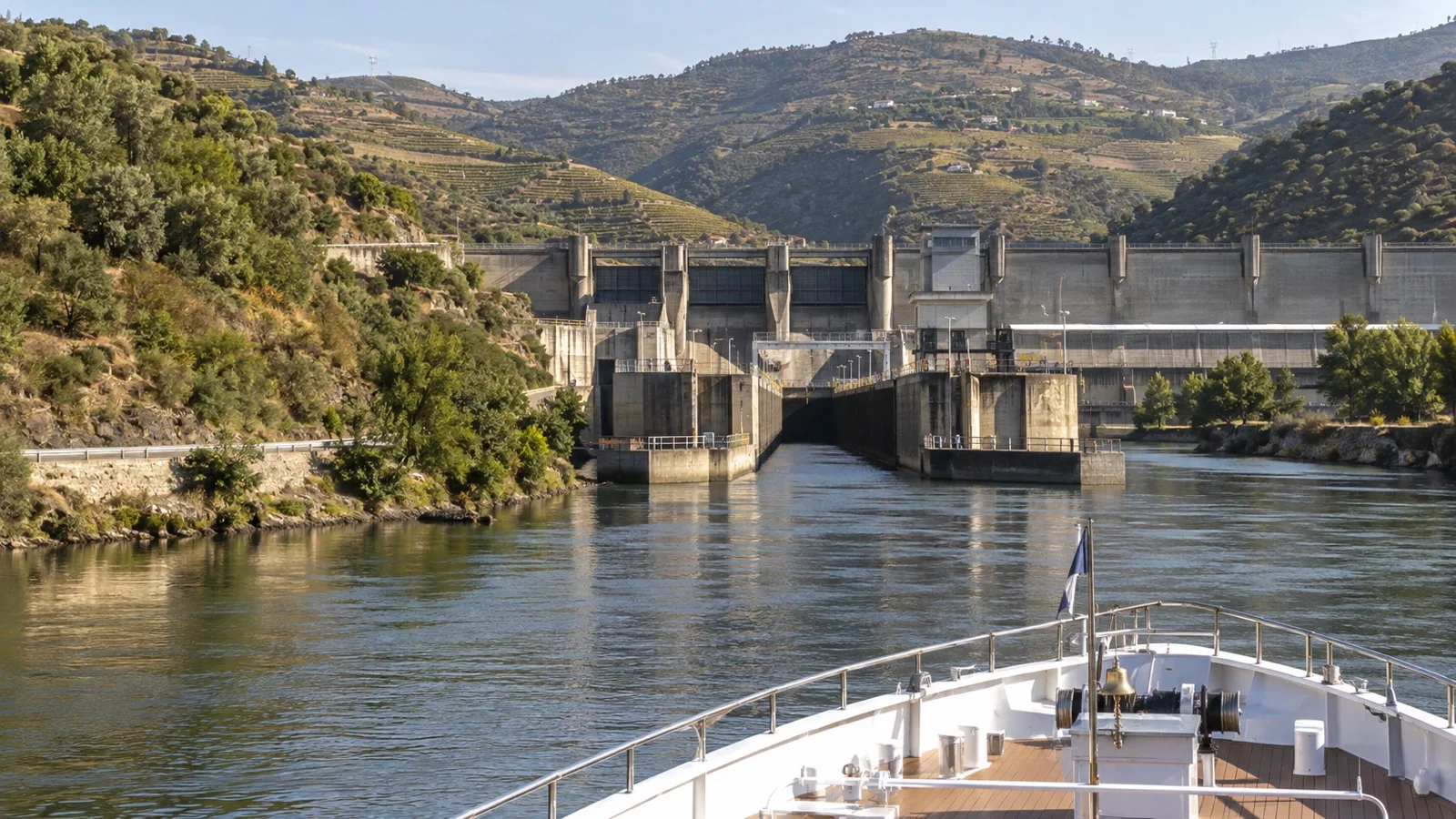 River cruise ship approaching a Douro dam lock
