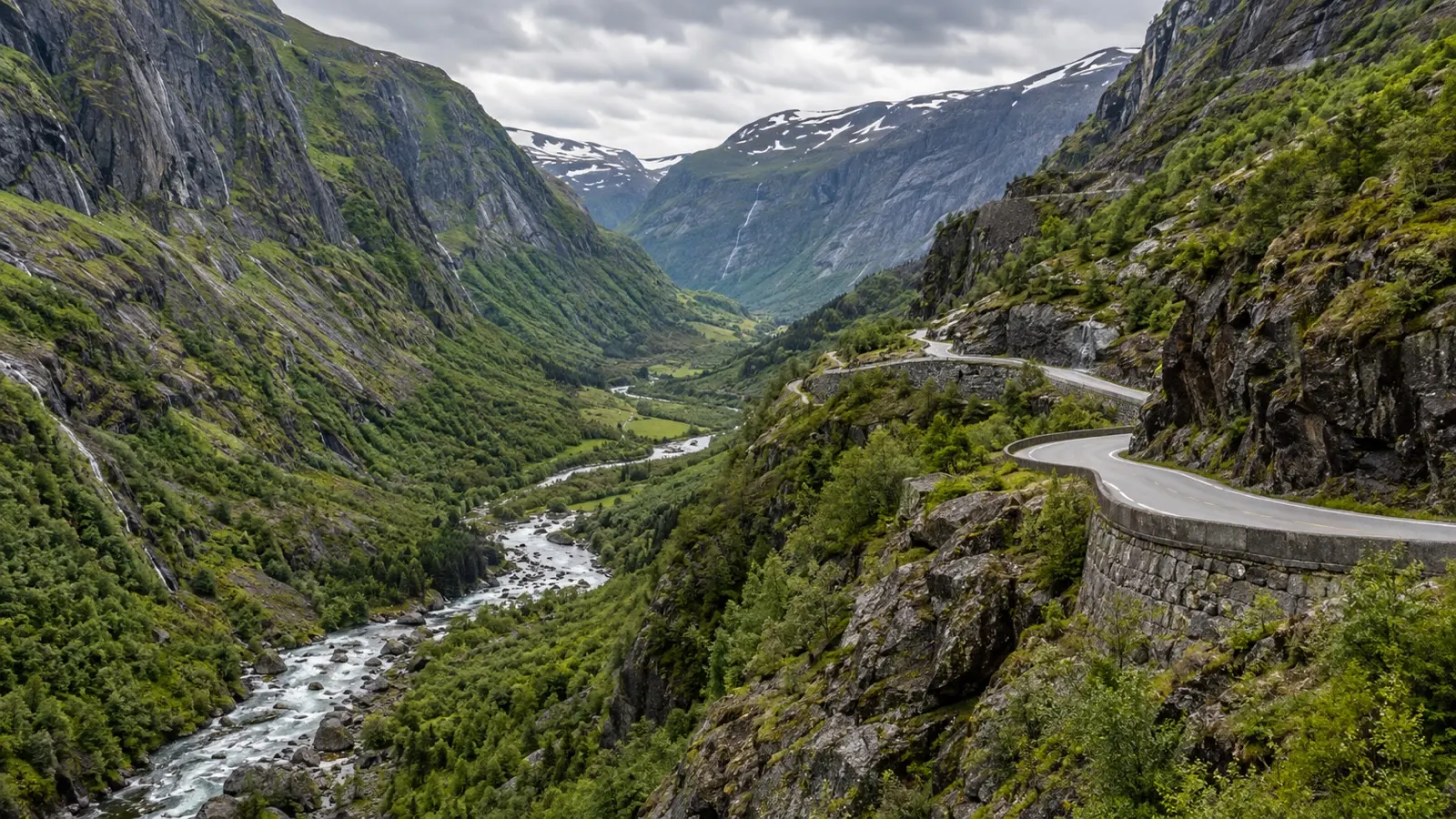 Winding road above the river through Måbødalen valley