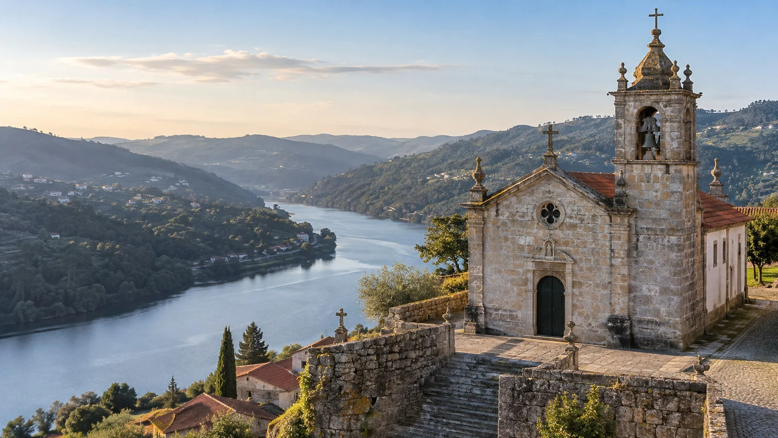 Church of Sao Miguel de Entre-os-Rios Portugal stone village church above Douro river hillside, no people