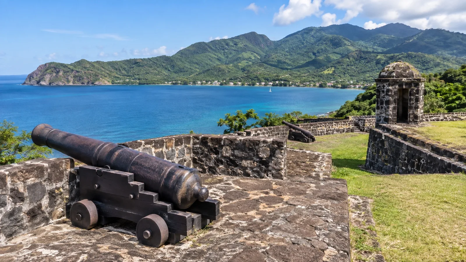 Stone ramparts and historic buildings at Fort Shirley in Cabrits National Park