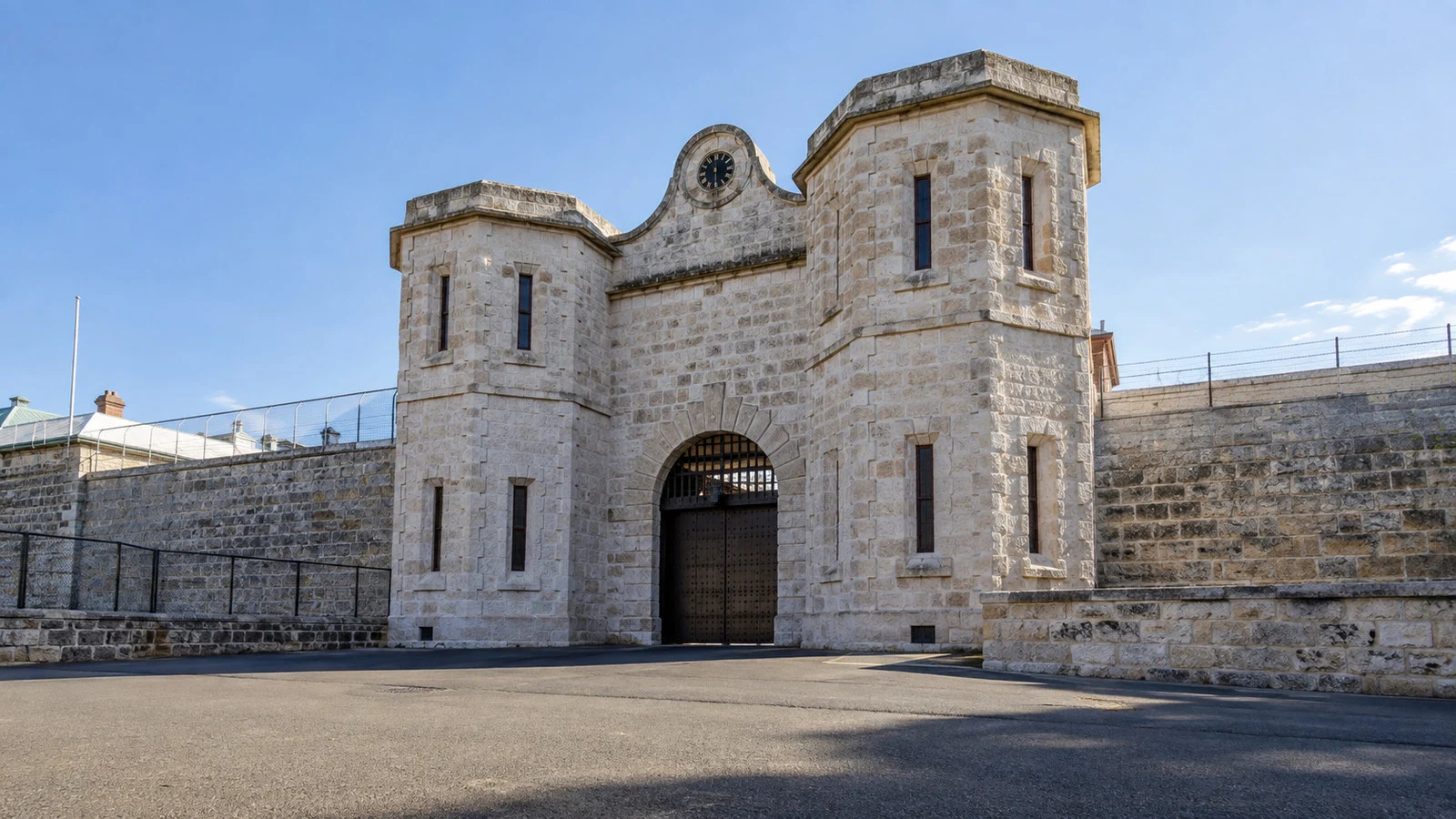 Historic limestone gate and walls of Fremantle Prison