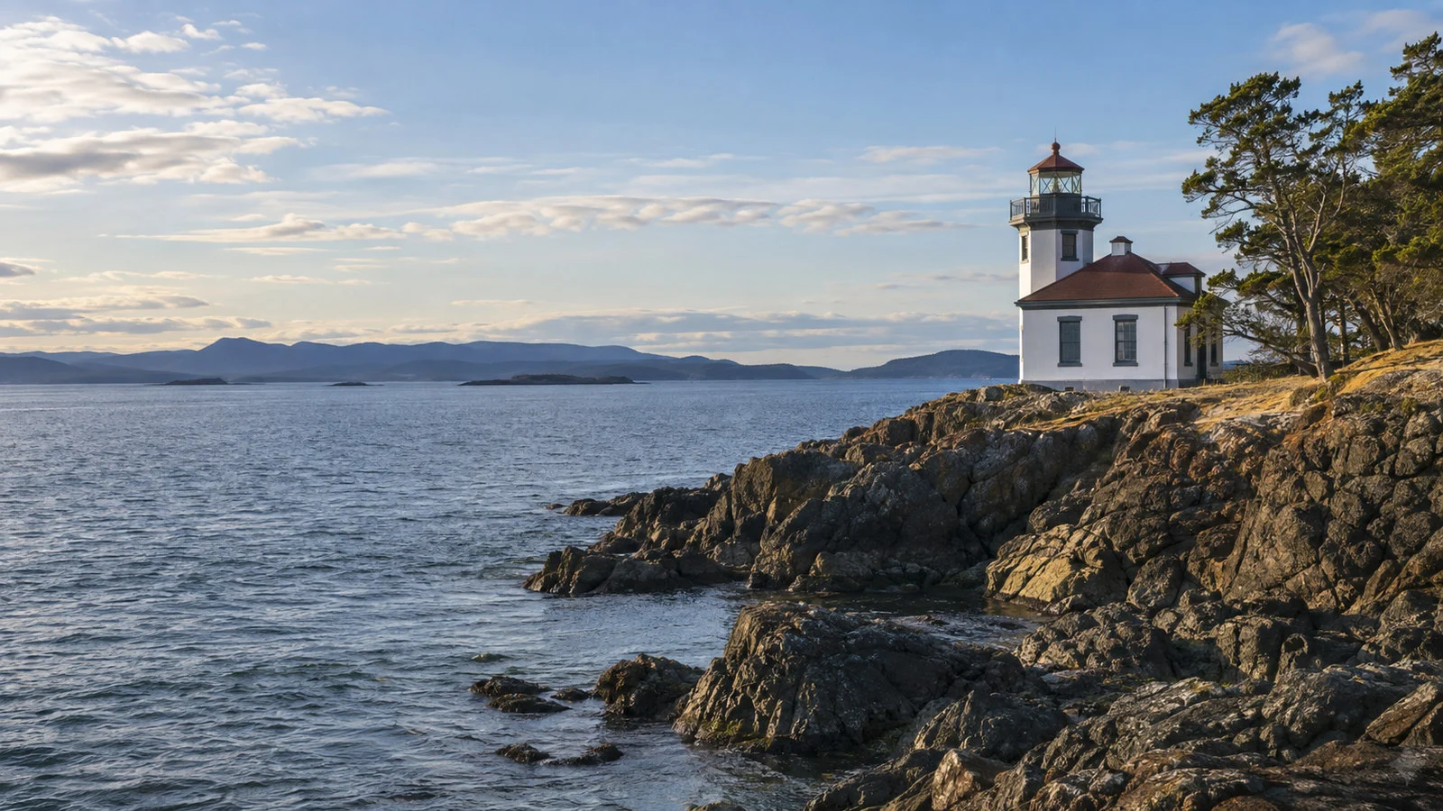 Lime Kiln Point Lighthouse San Juan Island Washington overlooking Haro Strait from rocky coast, no people