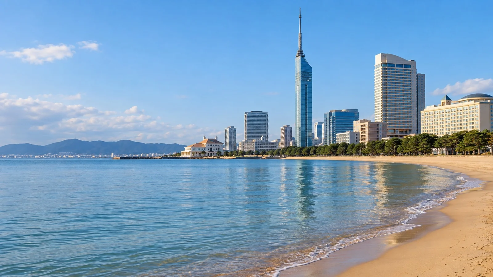 Seaside Momochi waterfront in Fukuoka with Fukuoka Tower, coastal hotels and calm Hakata Bay