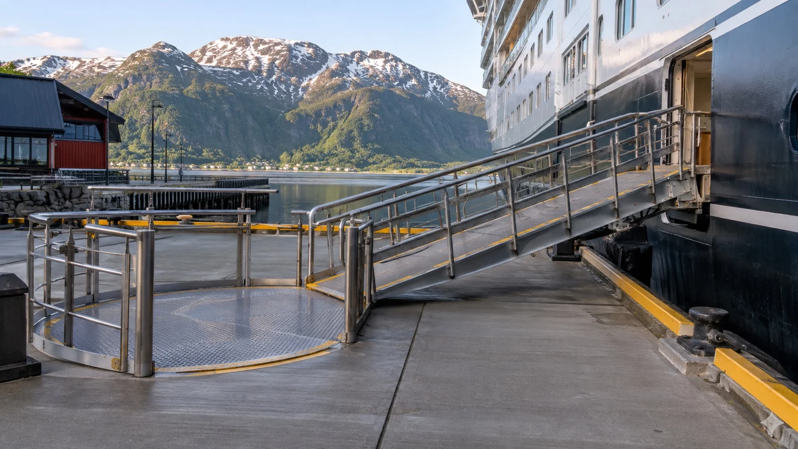 Empty cruise pier showing gangway slope and wheelchair turning area