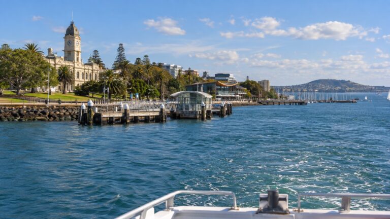 Tender boat approaching Geelong waterfront on Corio Bay