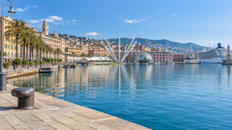 Genoa’s Porto Antico waterfront with a cruise ship near the historic center