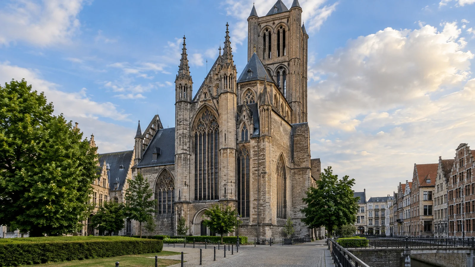 exterior of Saint Bavo Cathedral in Ghent, the church that houses the Ghent Altarpiece, with its stone Gothic facade