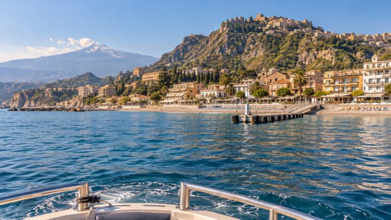 Tender boat approaching Giardini Naxos below Taormina
