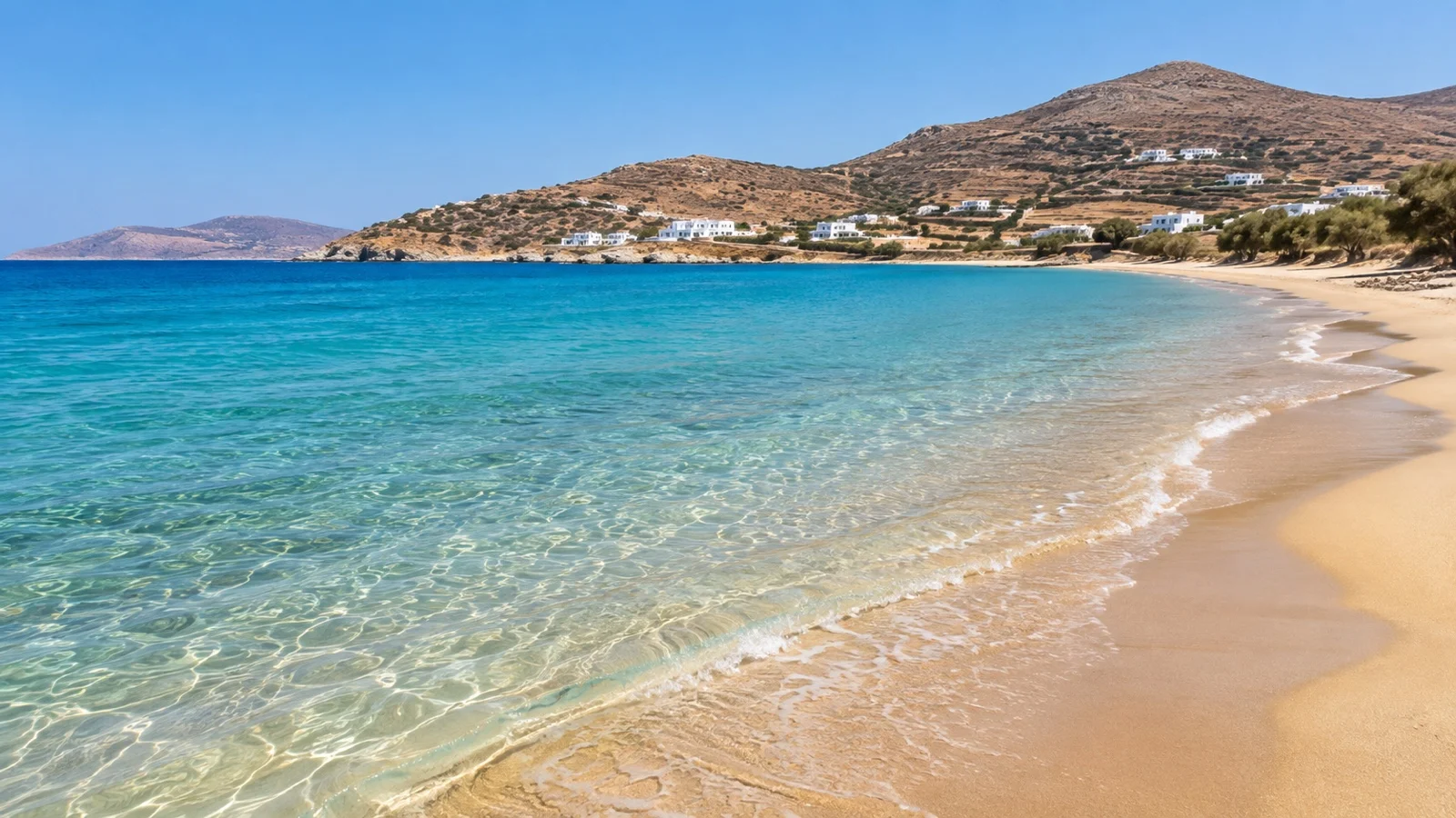 Sandy beach and clear Aegean water on Paros