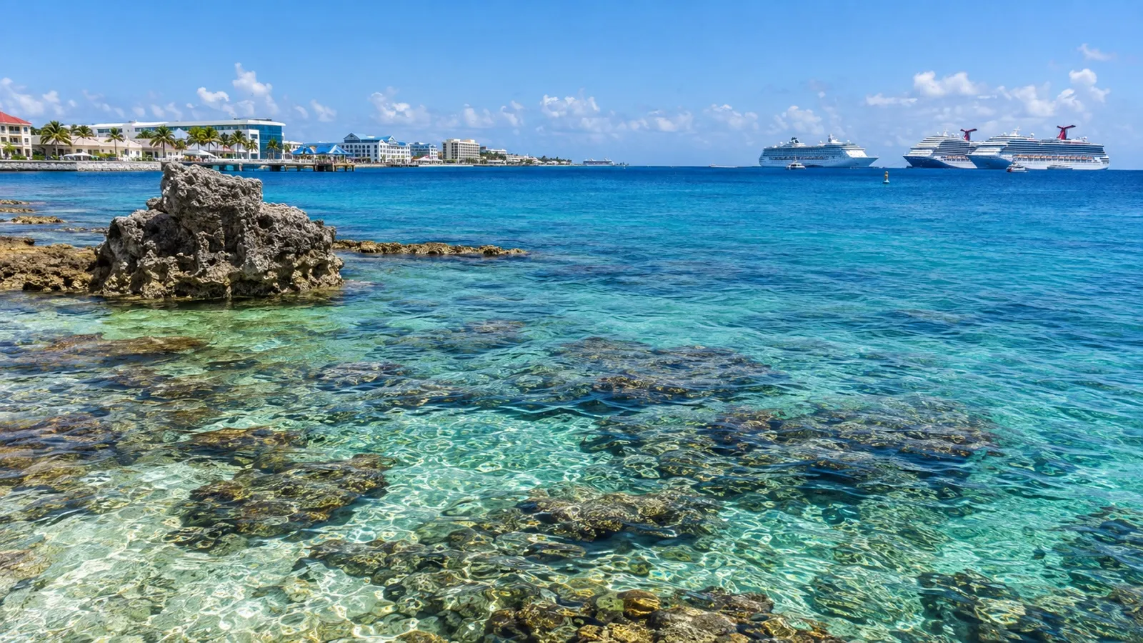 Nearshore reef water at Eden Rock in George Town with cruise ships offshore