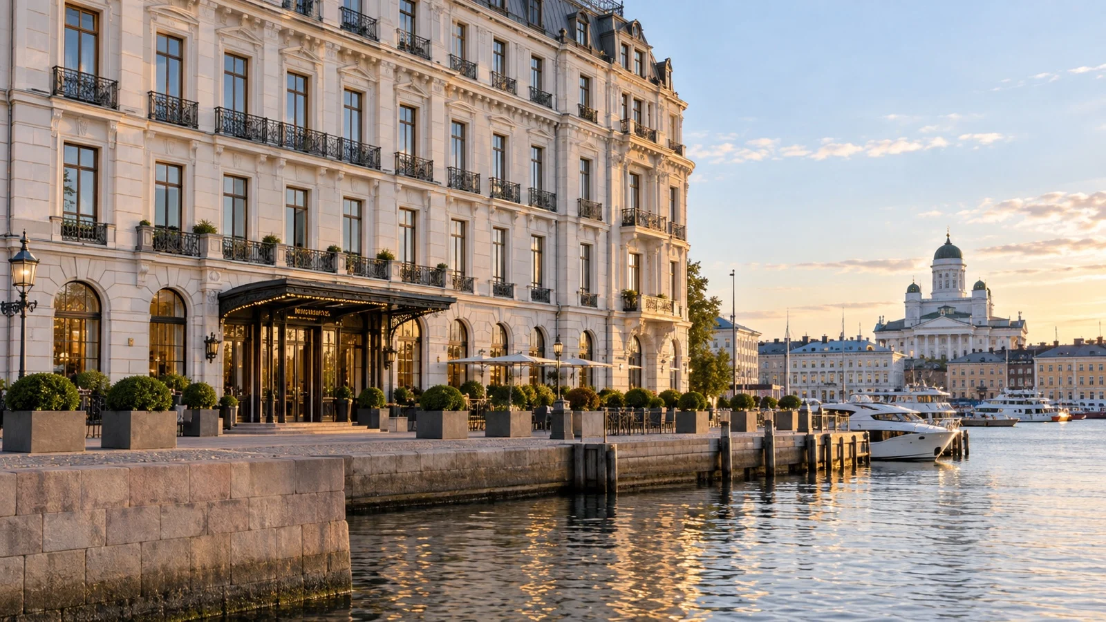 Elegant Helsinki luxury hotel exterior near Market Square with pale stone architecture and waterfront