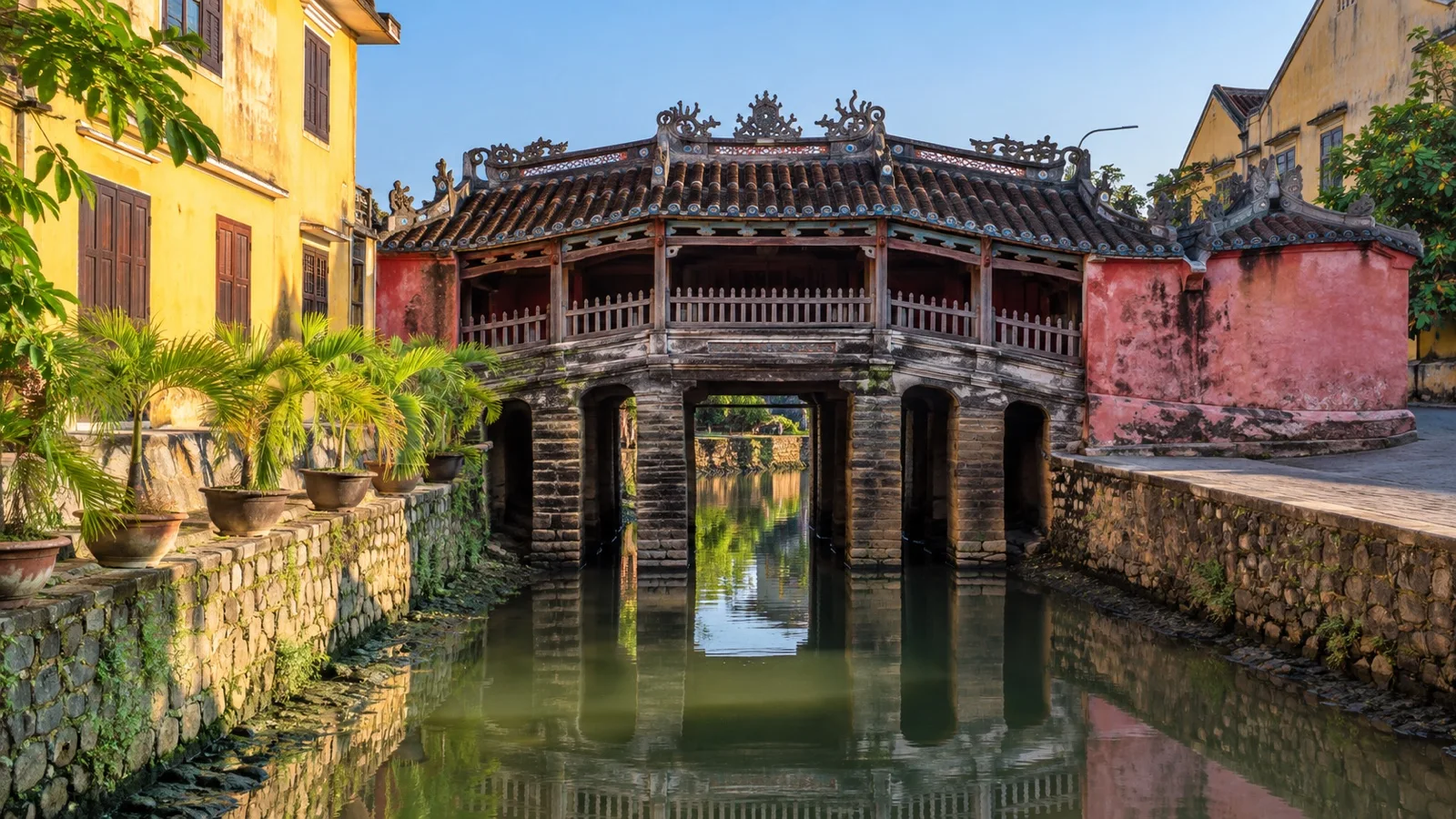 The historic Japanese Covered Bridge over its canal in Hoi An