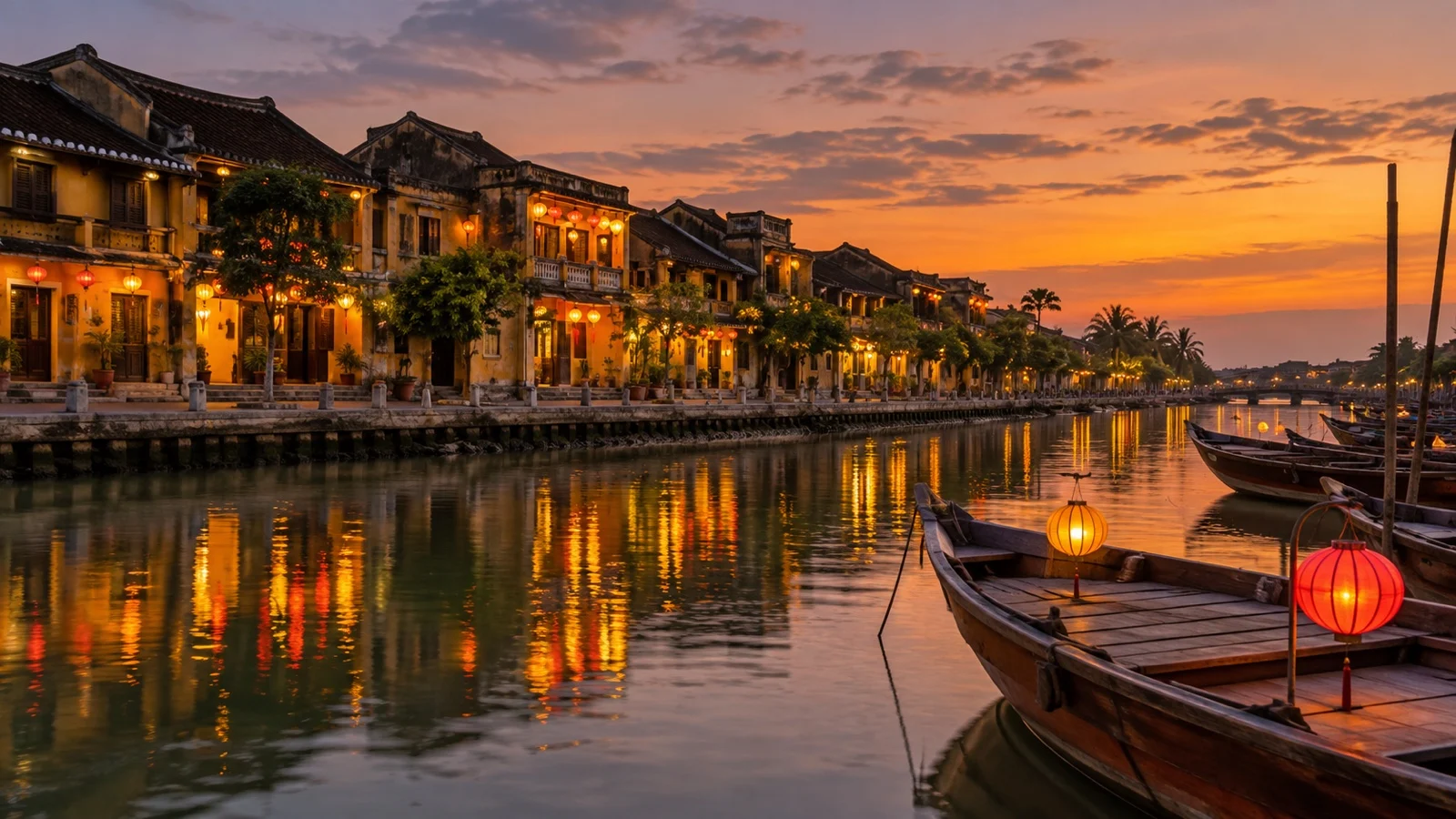 Lanterns reflected in the Thu Bon River beside Hoi An old town at dusk