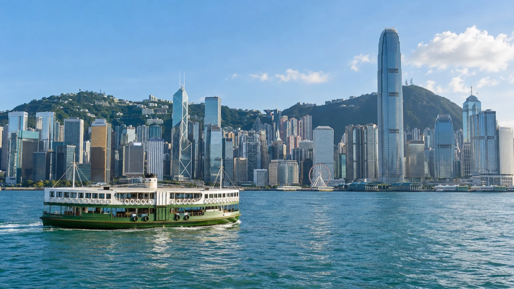 Star Ferry on Victoria Harbour below the Hong Kong skyline