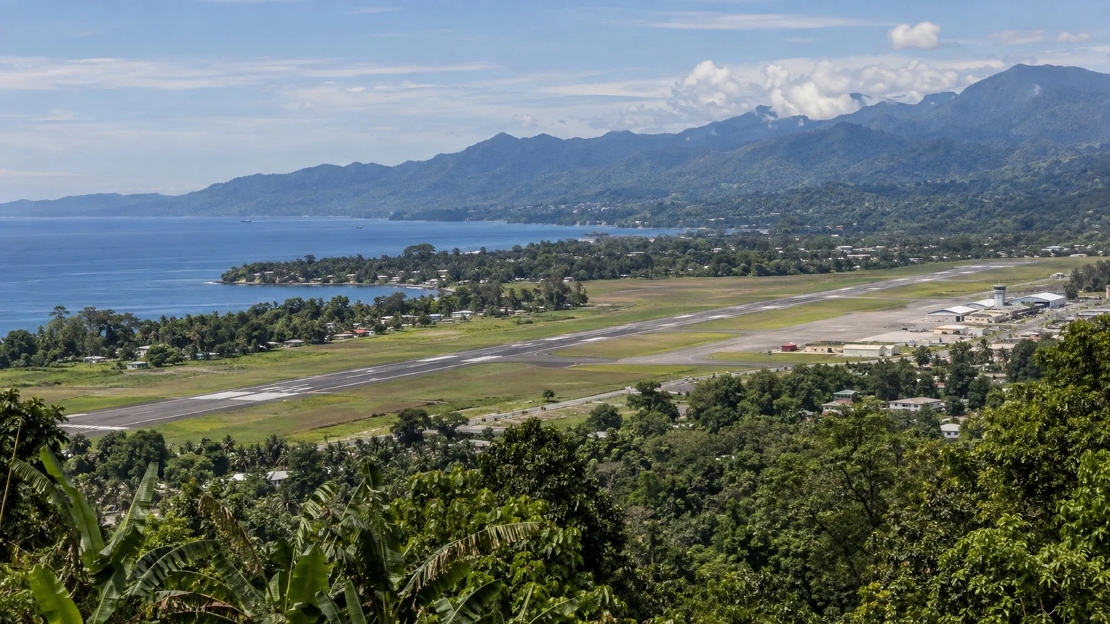 Honiara Henderson Field airport runway and coast