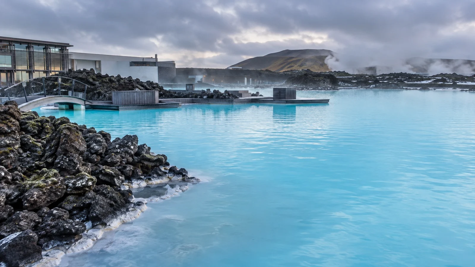 Milky blue geothermal water and lava rocks at Iceland’s Blue Lagoon