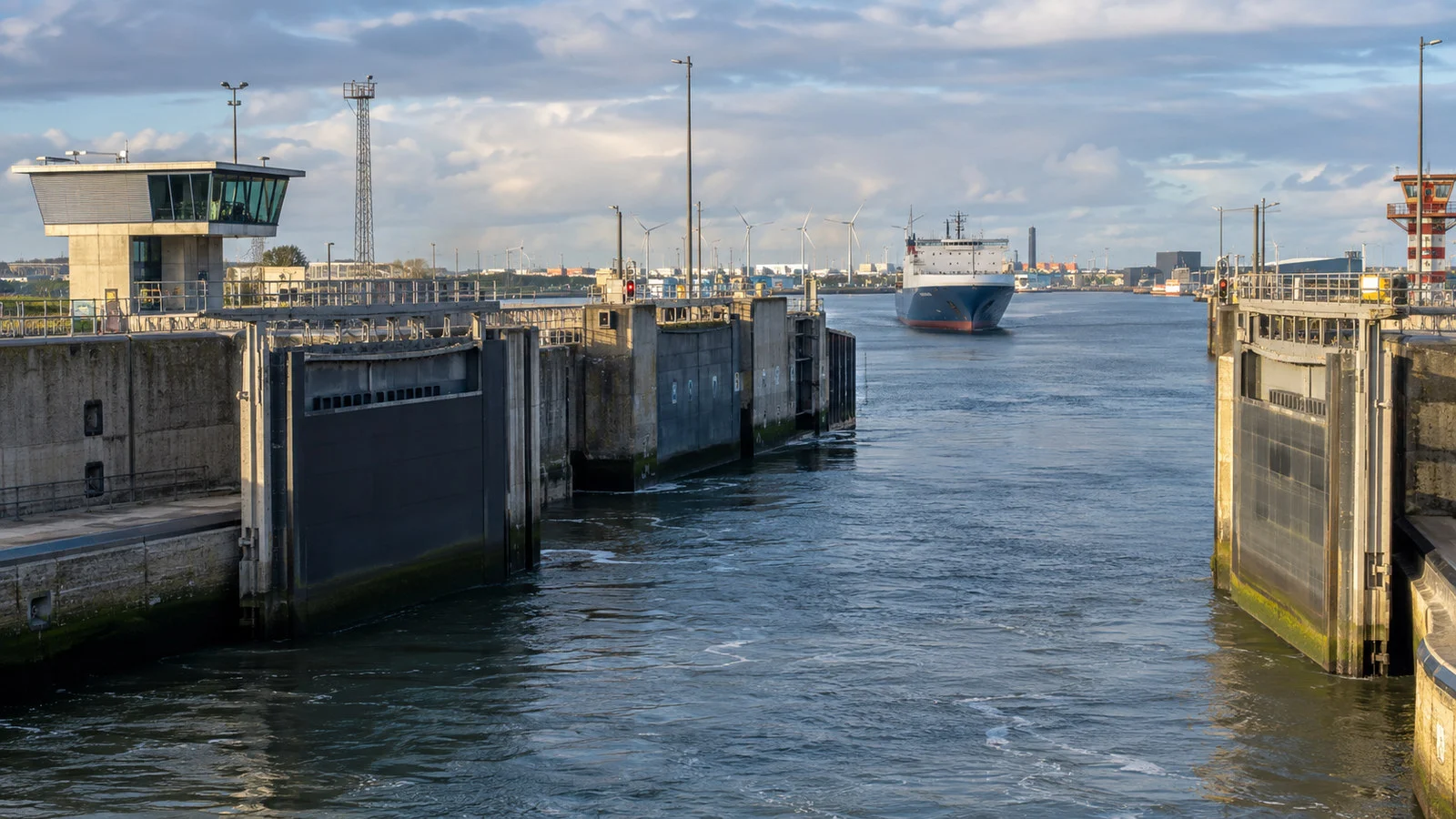 IJmuiden sea locks Netherlands huge lock gates, industrial harbor infrastructure and vessel, no people