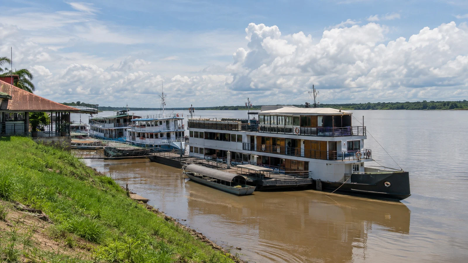 Passenger boats moored along the river port at Nauta, Peru