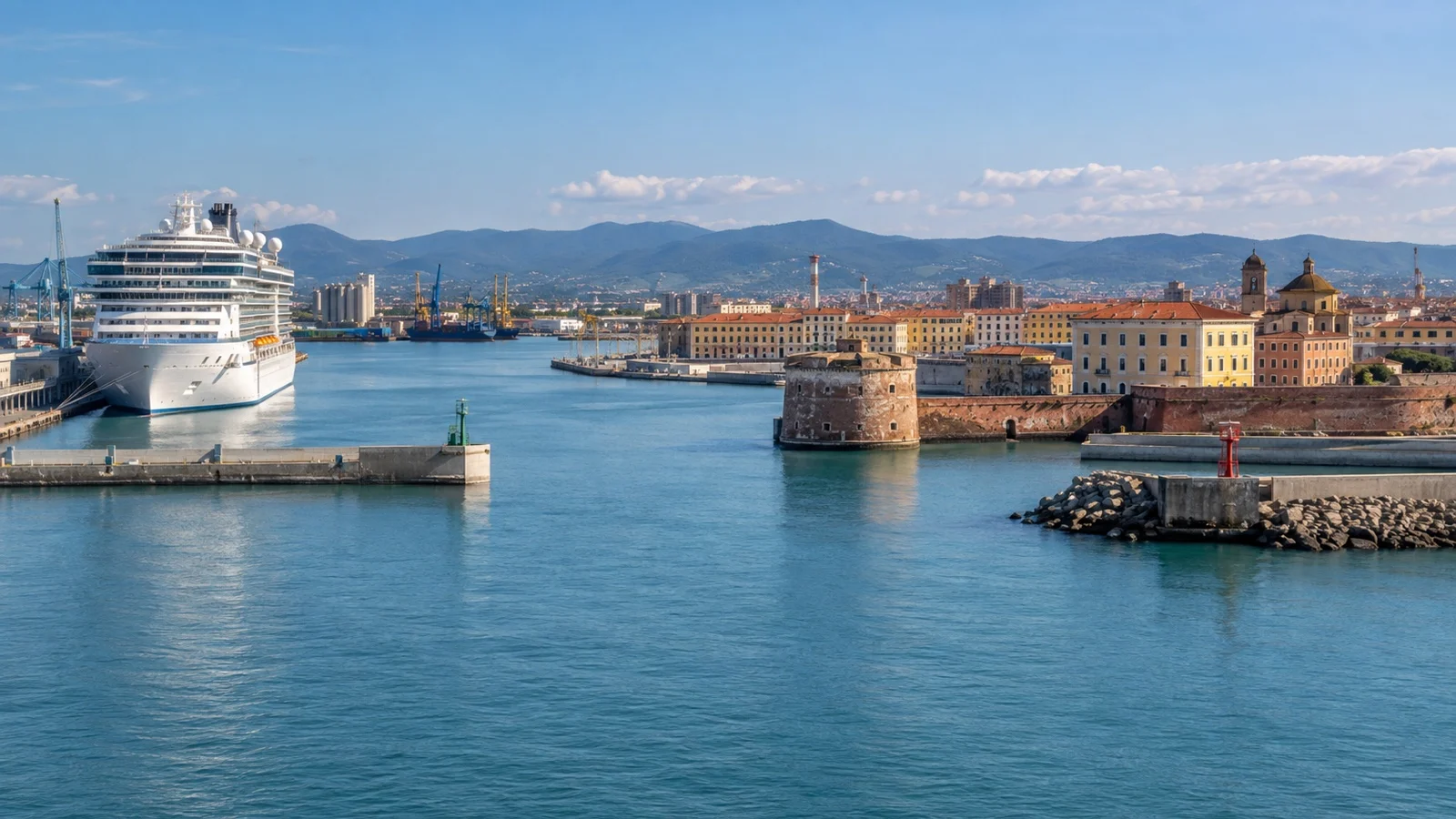 Cruise ship at Livorno harbor on the Tuscan coast with port canals and Italian buildings