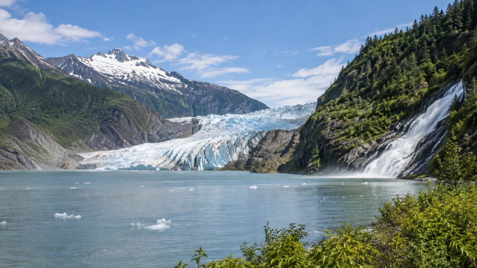 Mendenhall Glacier and Nugget Falls across the lake near Juneau