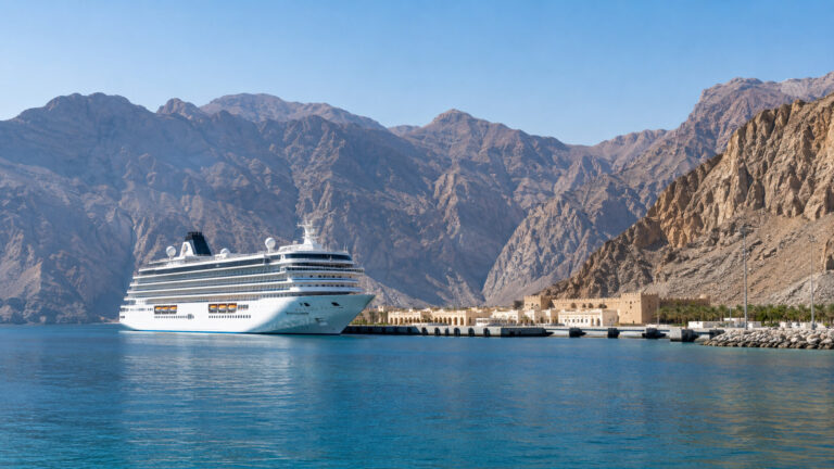 Cruise ship at Khasab port below the Musandam mountains