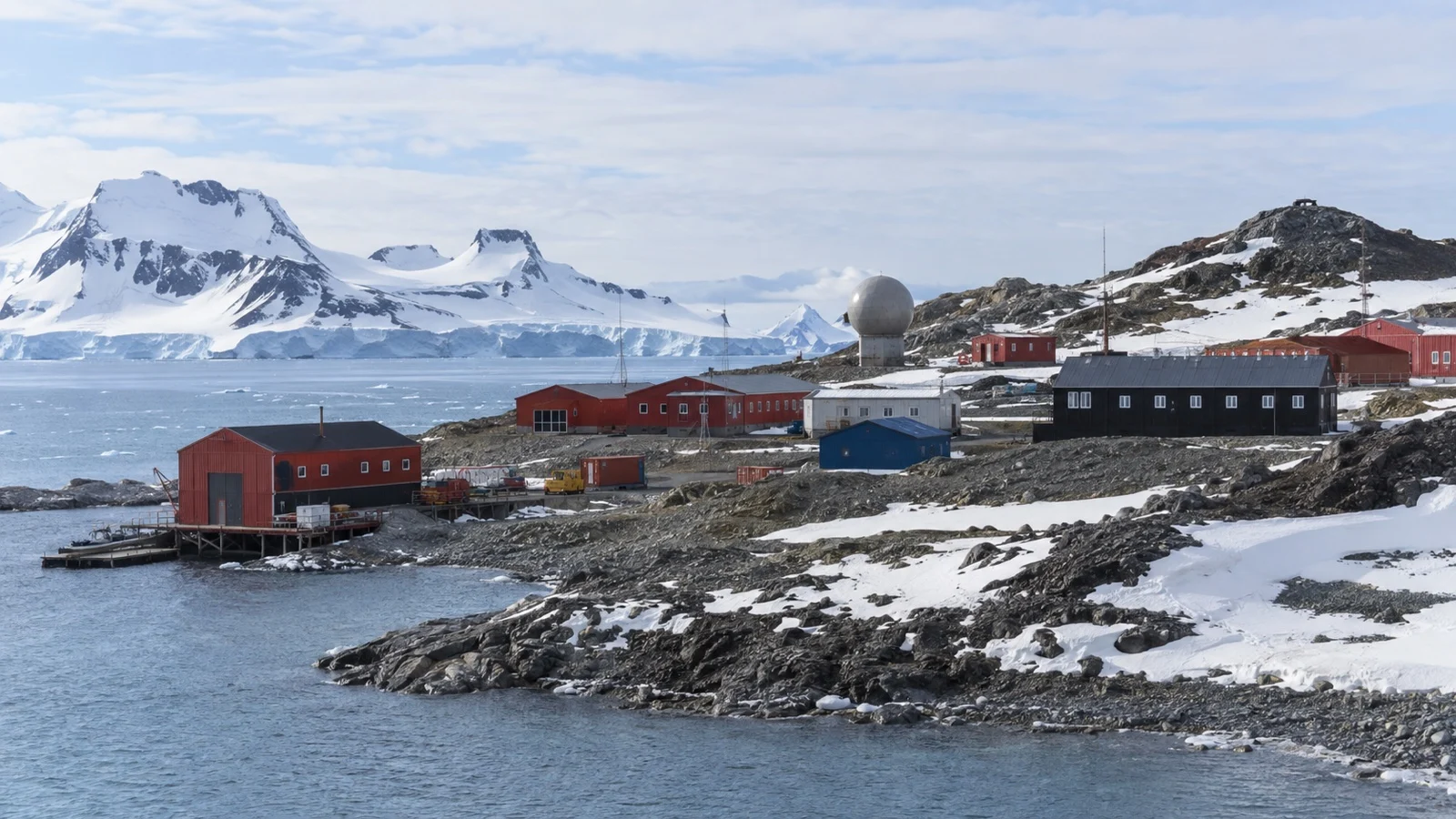 Research station buildings on the rocky Fildes Peninsula of King George Island, Antarctica