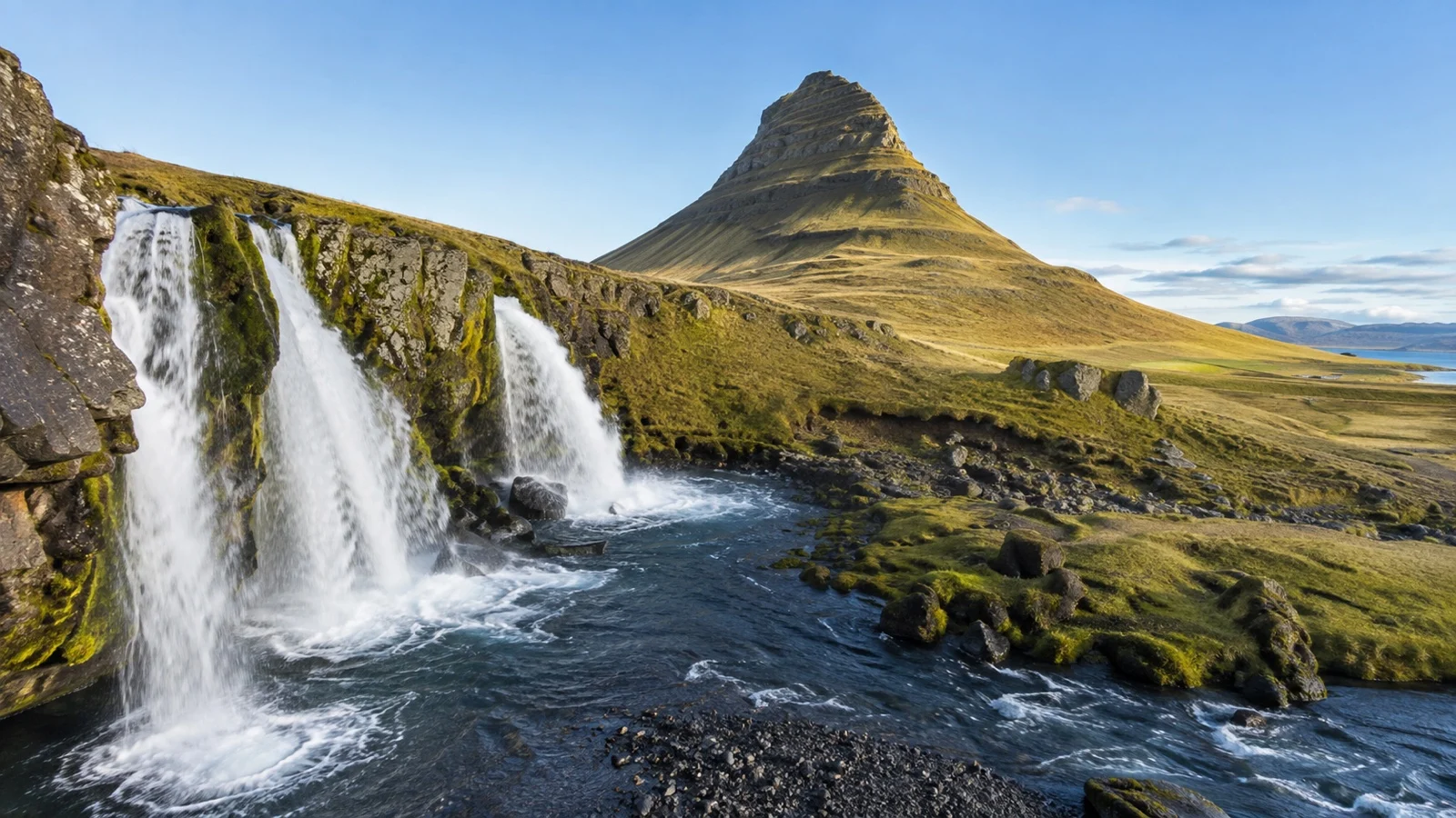 Kirkjufellsfoss waterfall below Kirkjufell mountain in Iceland