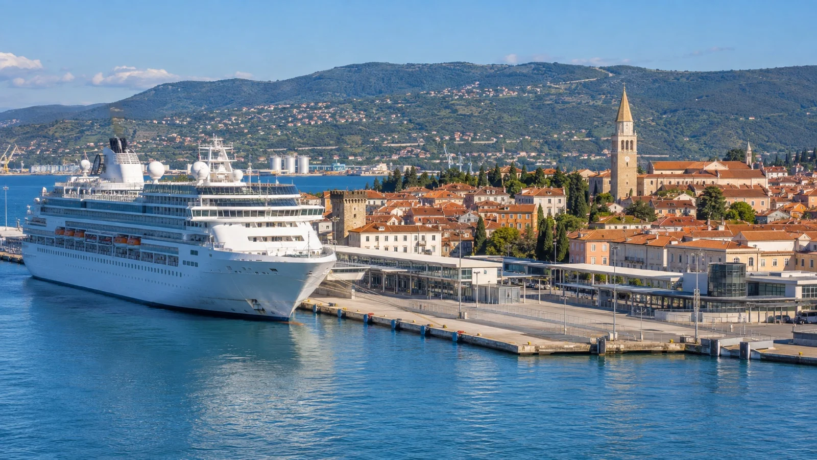 Cruise ship at Koper quay with the Slovenian old town close behind