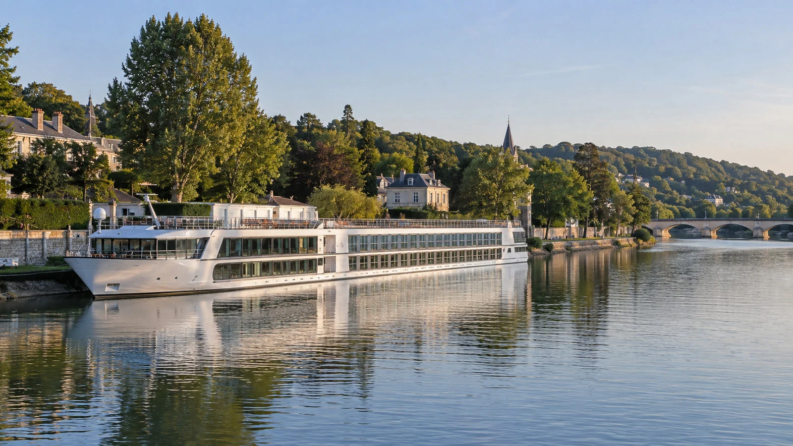 Seine river cruise vessel moored along Le Pecq waterfront west of Paris