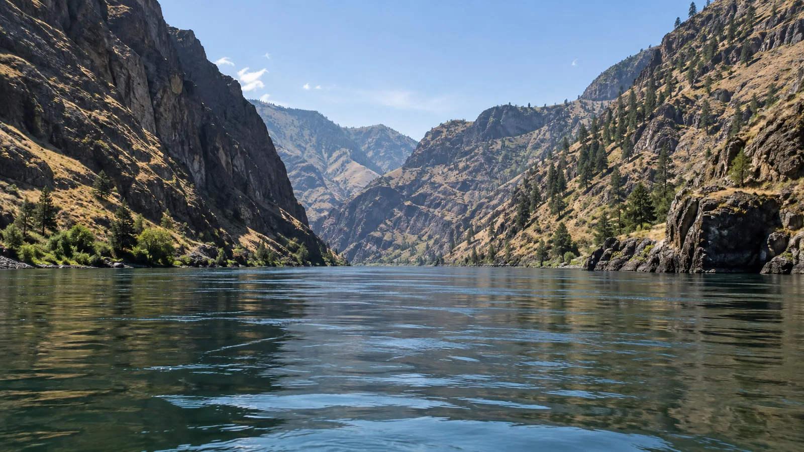 Hells Canyon cliffs and the Snake River from a boat-level viewpoint