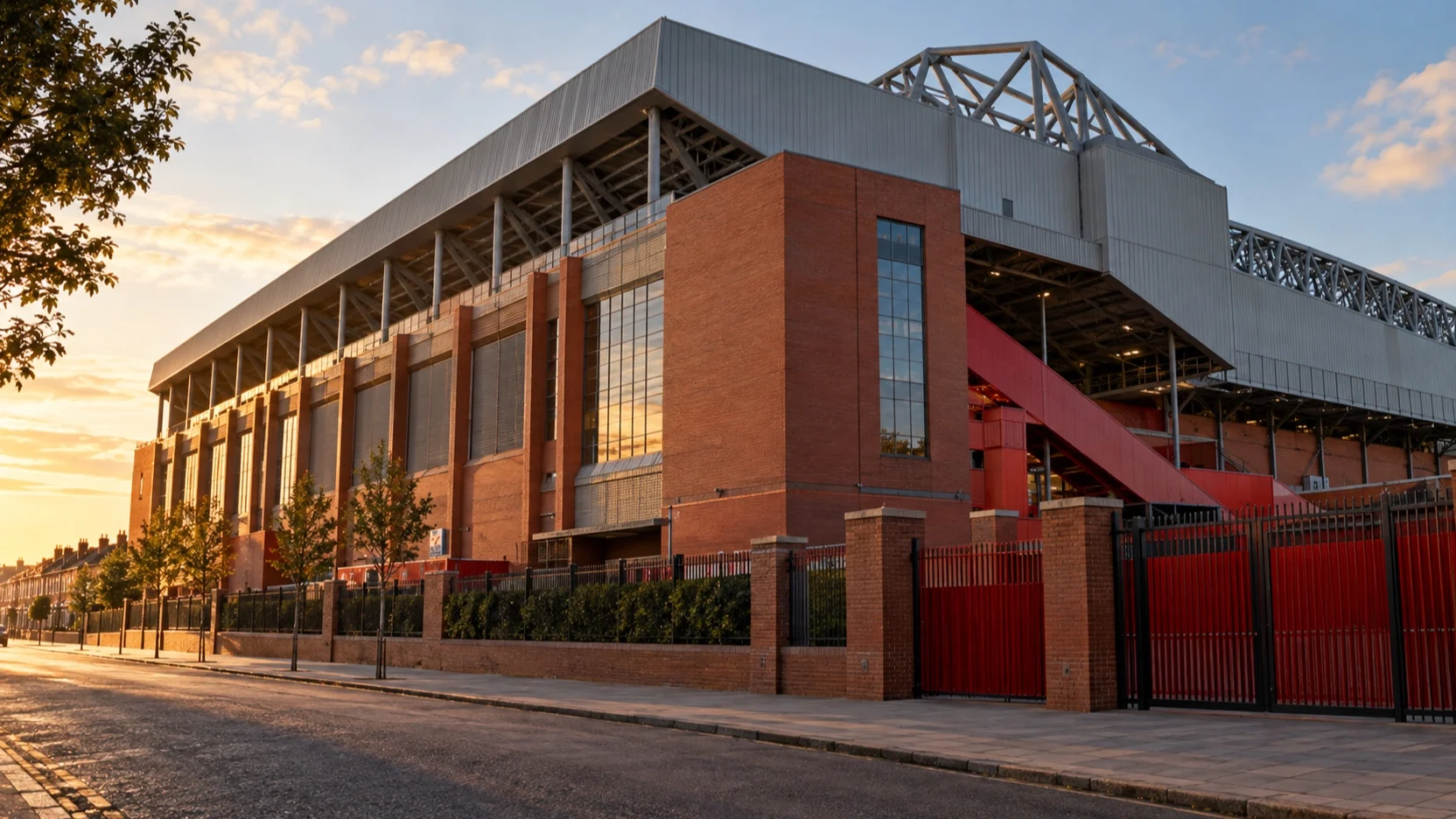 The exterior of Anfield football stadium on a quiet Liverpool street