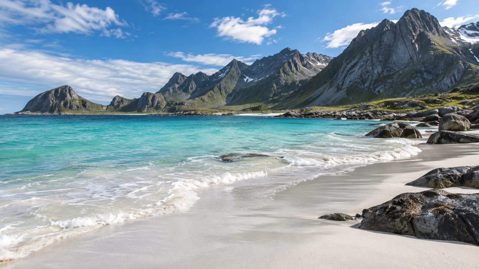 White sand and turquoise water at Haukland Beach in Norway's Lofoten Islands