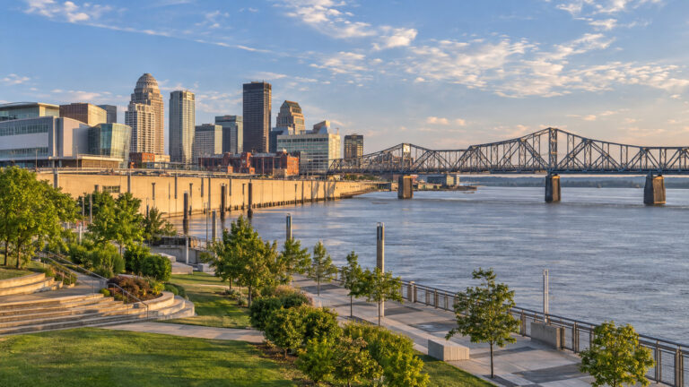 Louisville Waterfront Park with downtown skyline and Clark Memorial Bridge