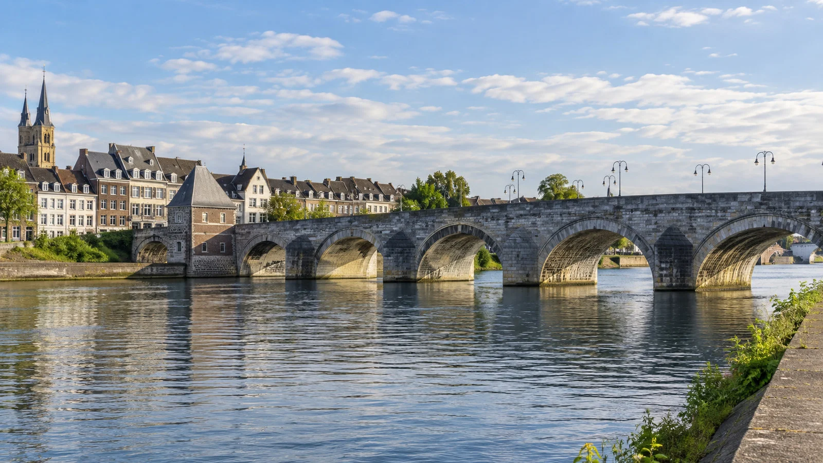 Historic Sint Servaasbrug stone bridge over the Meuse in Maastricht