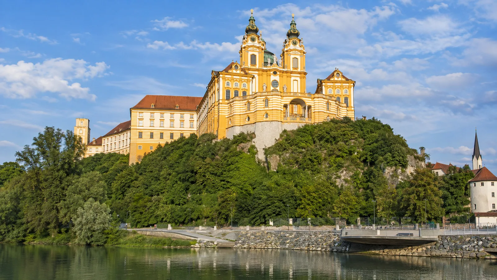 Melk Abbey's Baroque golden facade above the town