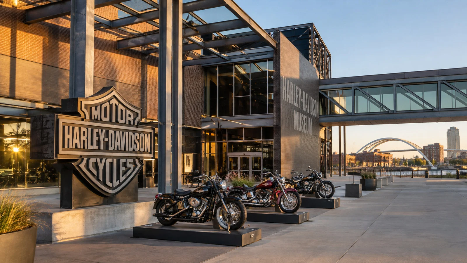 Harley-Davidson Museum Milwaukee modern industrial brick and steel exterior with motorcycles displayed outdoors but no people