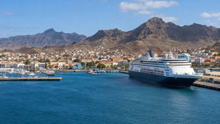 Cruise ship docked in Mindelo harbor below São Vicente’s arid mountains