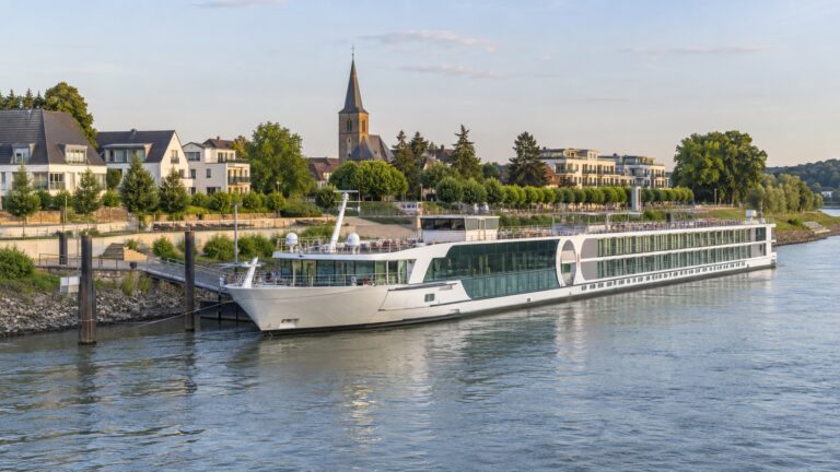 River cruise ship moored at Monheim’s Rhine promenade