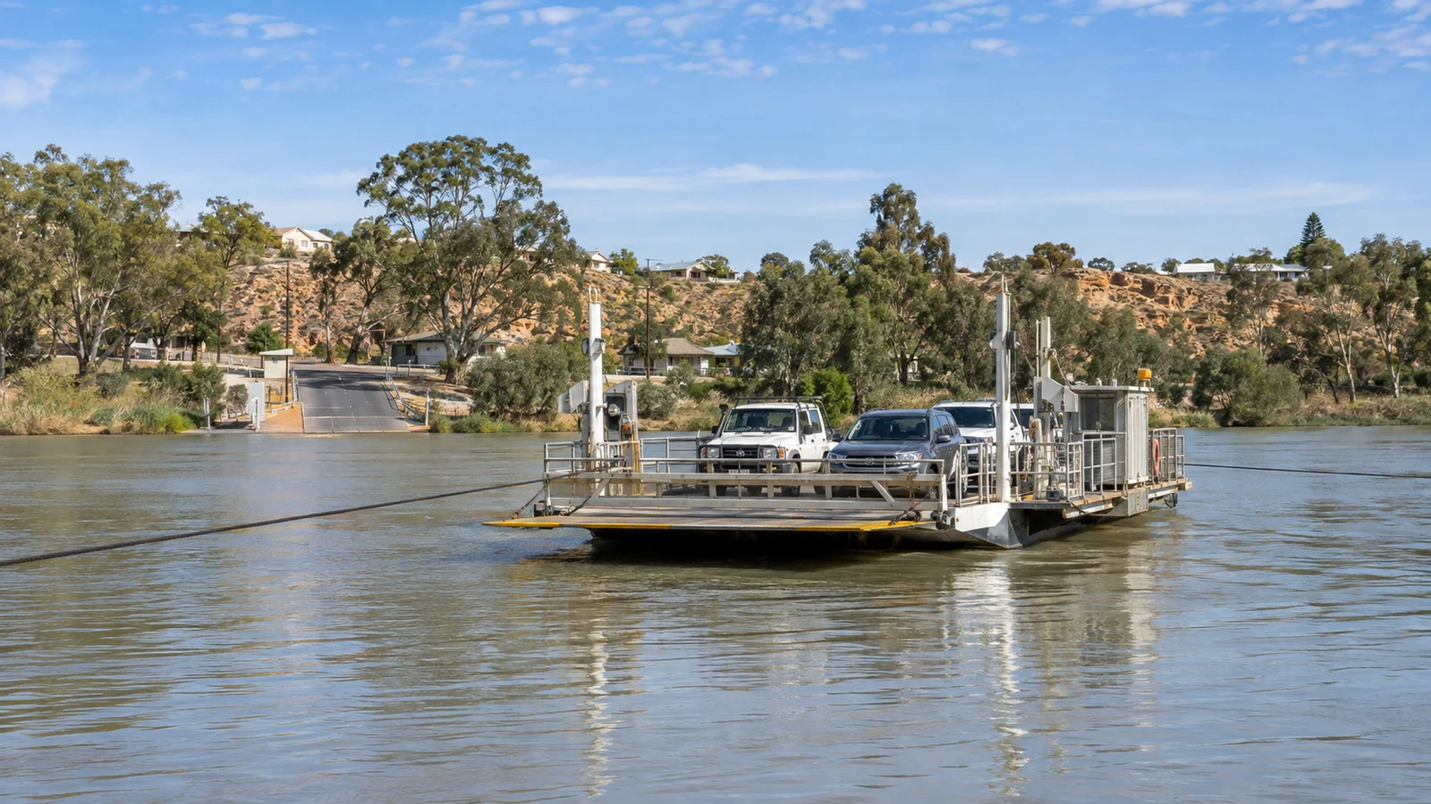 Vehicles aboard the Morgan cable ferry crossing the Murray River