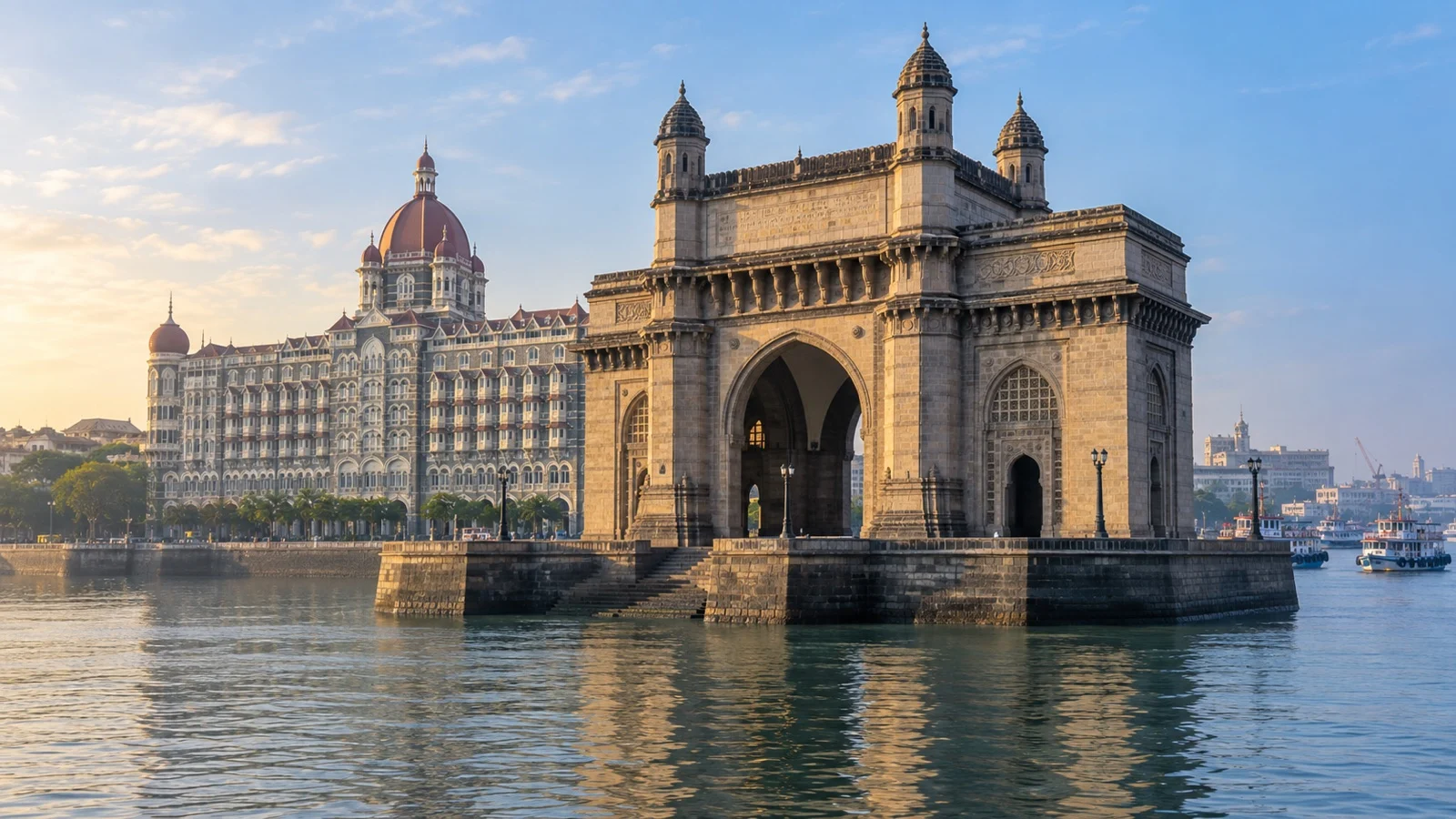 Gateway of India arch beside Mumbai harbor and the Taj Mahal Palace Hotel