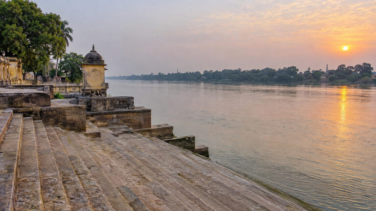 Stone steps of Hazarduari Bathing Ghat descending to the Bhagirathi River in Murshidabad