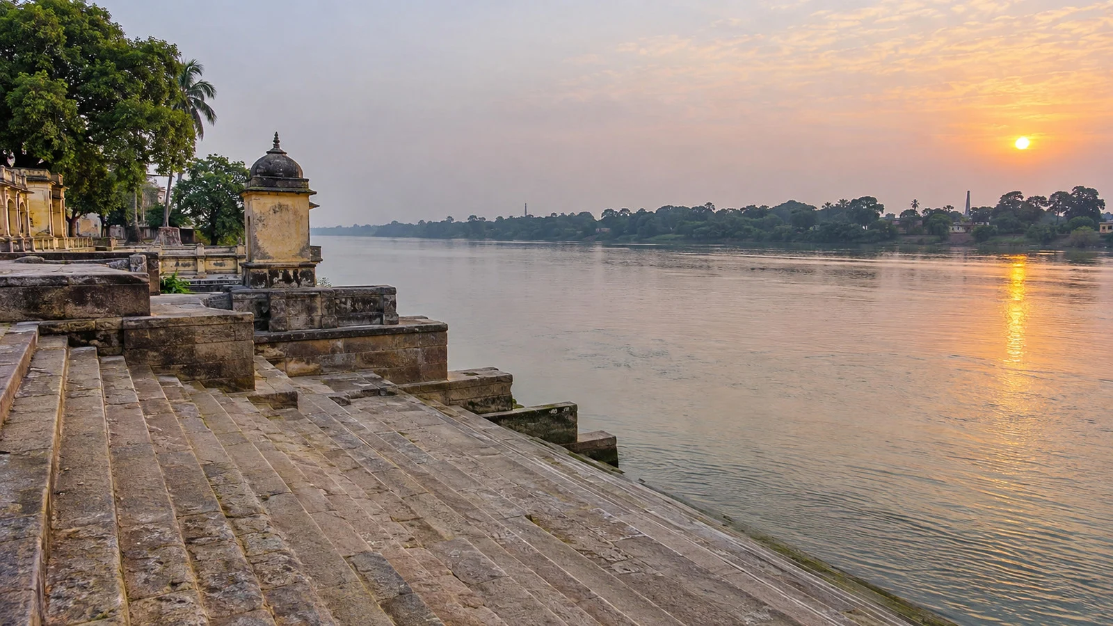 Stone steps of Hazarduari Bathing Ghat descending to the Bhagirathi River in Murshidabad