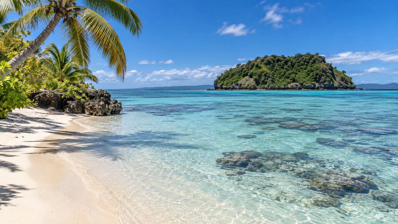 Shallow lagoon and pale sand on Mystery Island