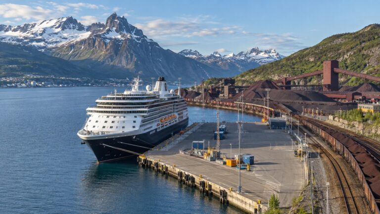 Cruise ship at Narvik Pier 3 beside working port facilities