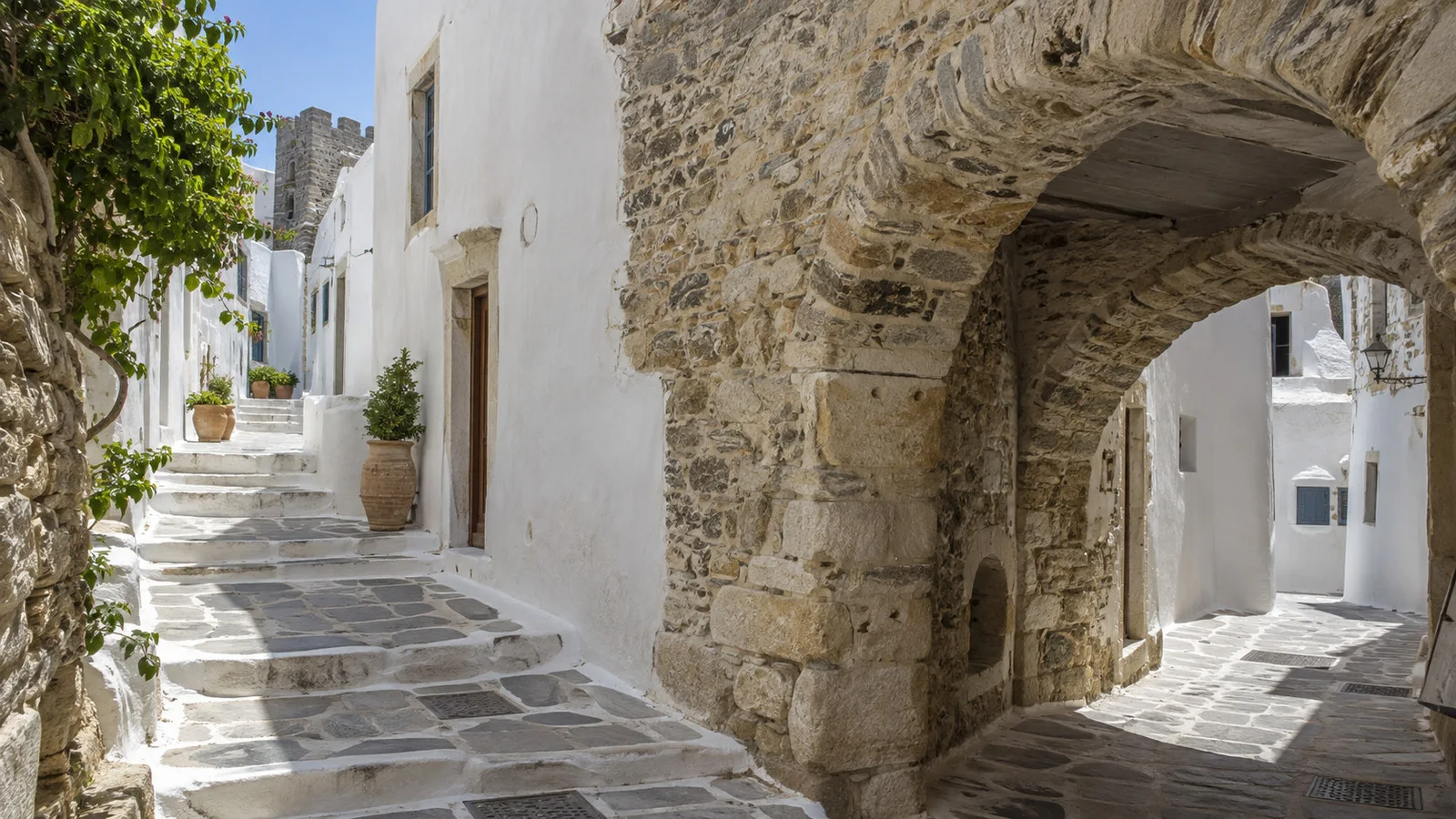 Whitewashed lanes and stone arches in the Naxos Kastro