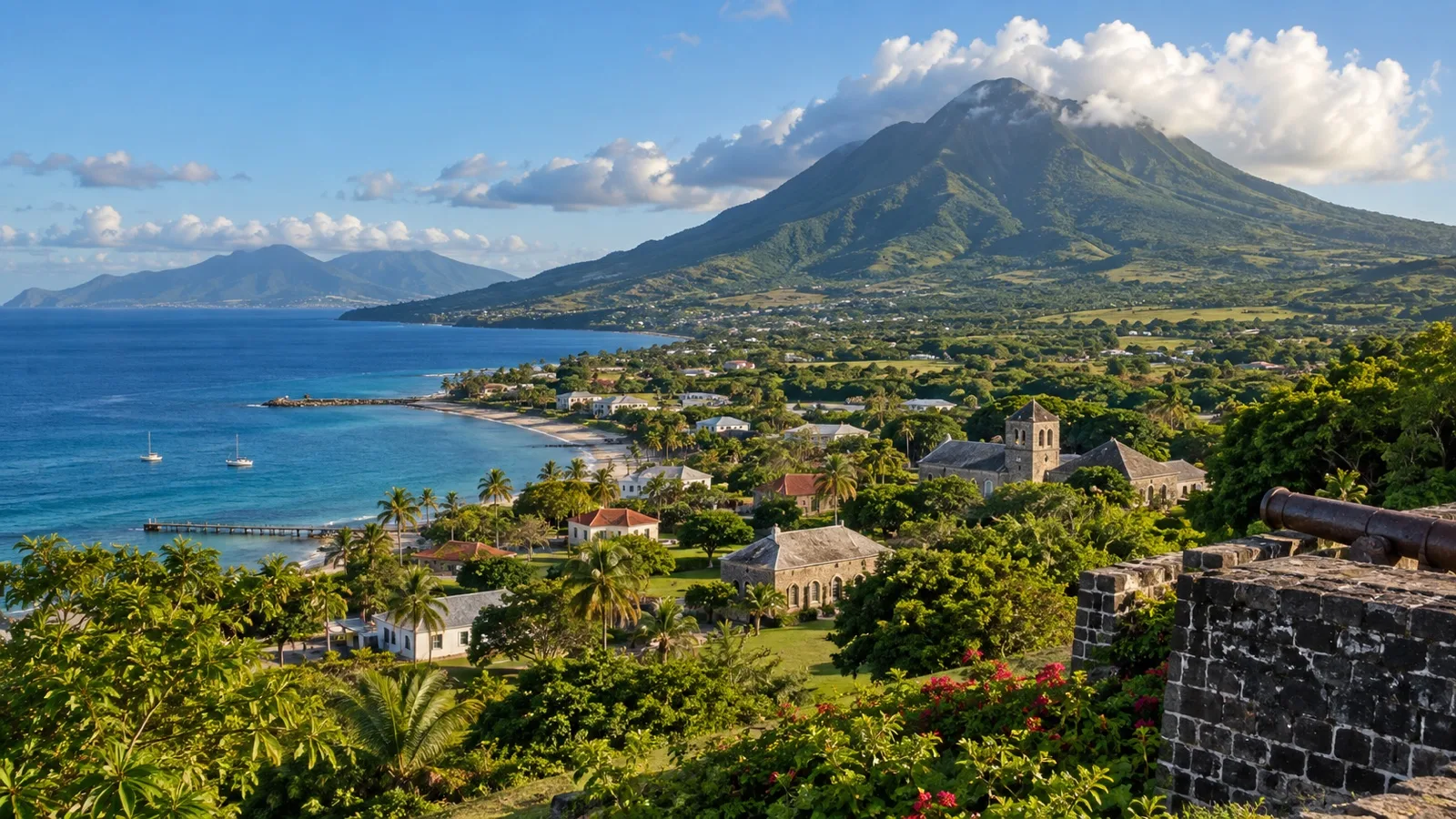 Nevis Peak rising above the island coast and Caribbean Sea