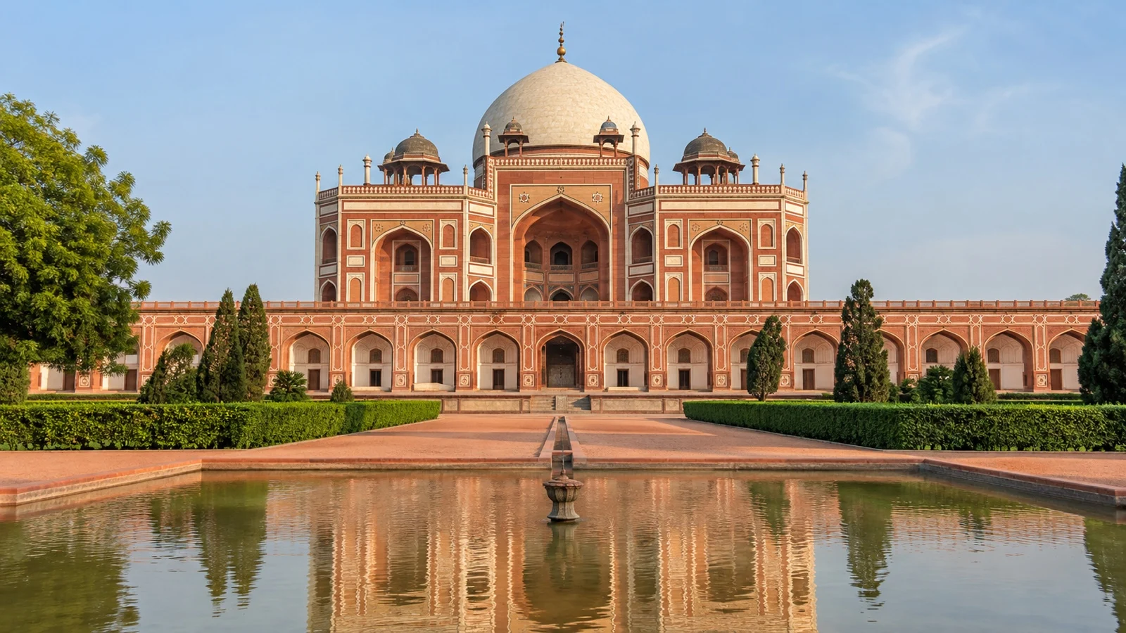 Humayun’s Tomb reflected in its garden water channel in New Delhi