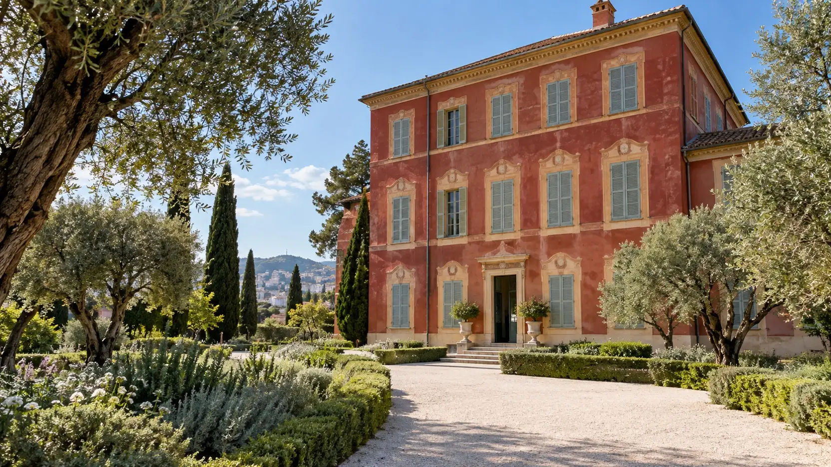 Red villa of the Musée Matisse amid olive trees in Nice’s Cimiez district