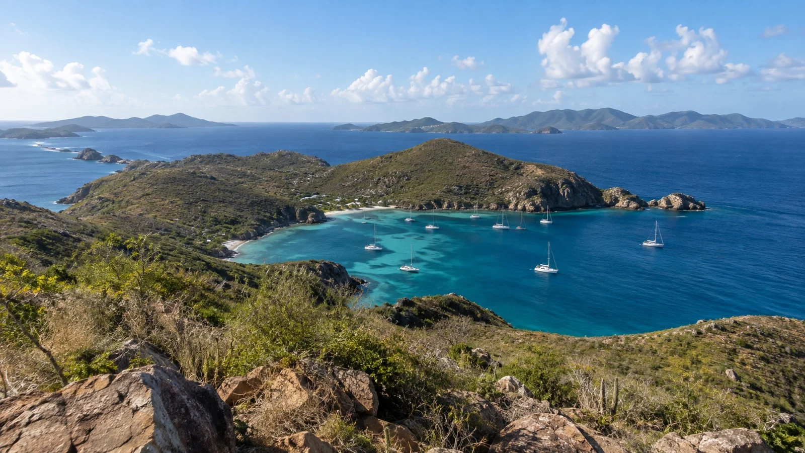 View from a dry ridge trail over Norman Island bays and the British Virgin Islands